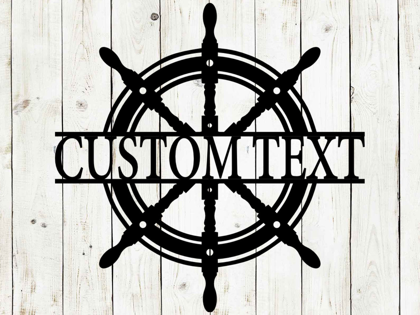 Personalized black metal ship wheel (helm) sign with 'CUSTOM TEXT' against a light wood background - Nautical wall decor