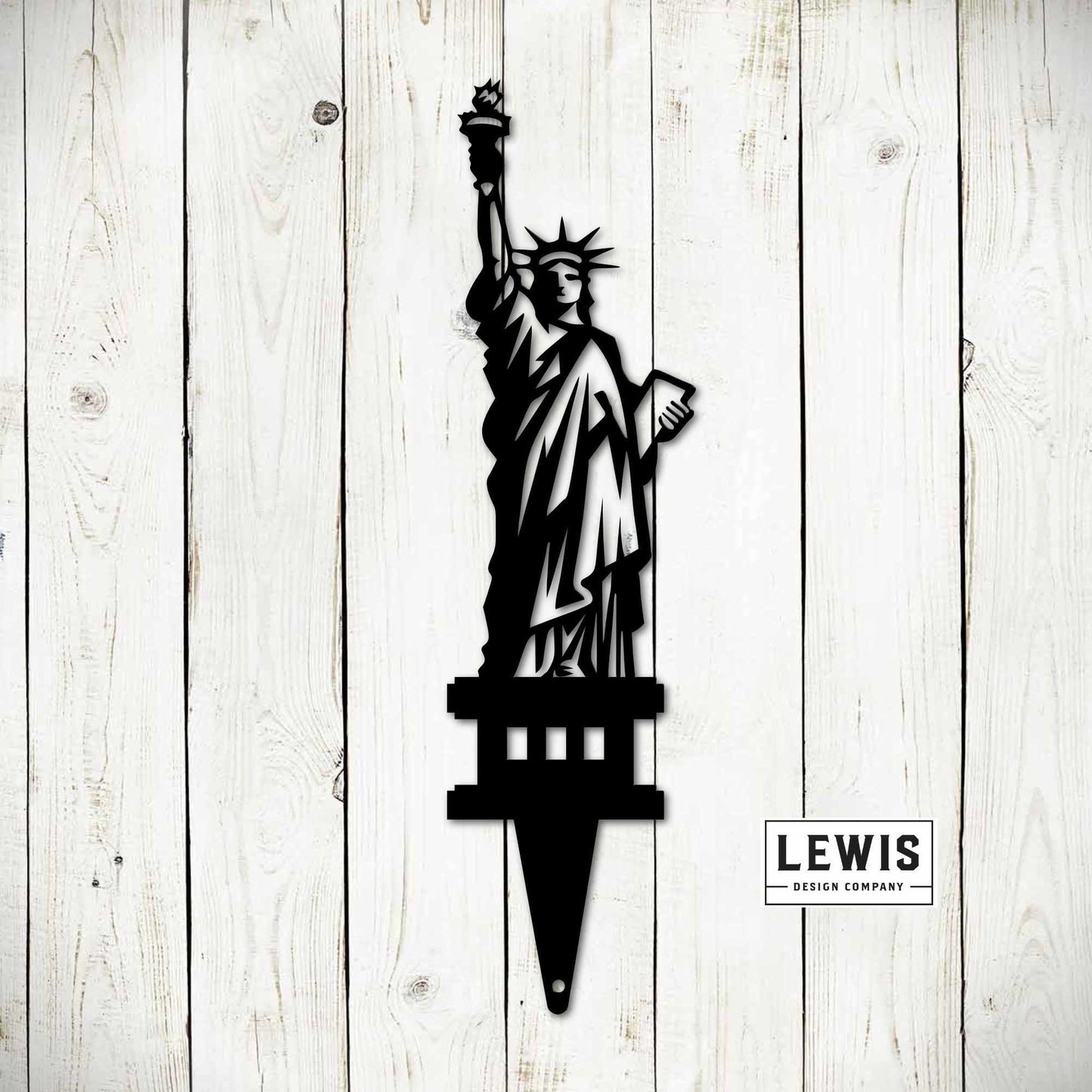 Statue of Liberty Metal Garden Stake - Black design, Patriotic Outdoor Sign on white wood background, Lewis Design Company.