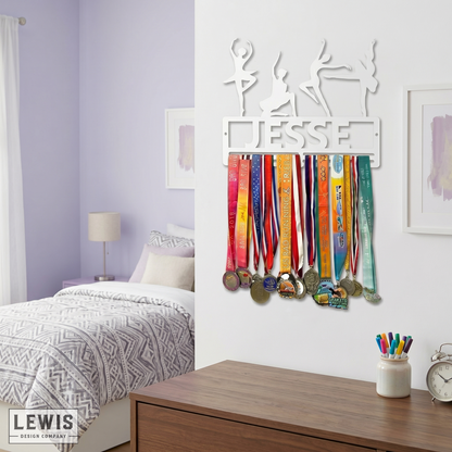 Medal holder with medals on a wall in a bedroom setting. Dance Medals and Awards