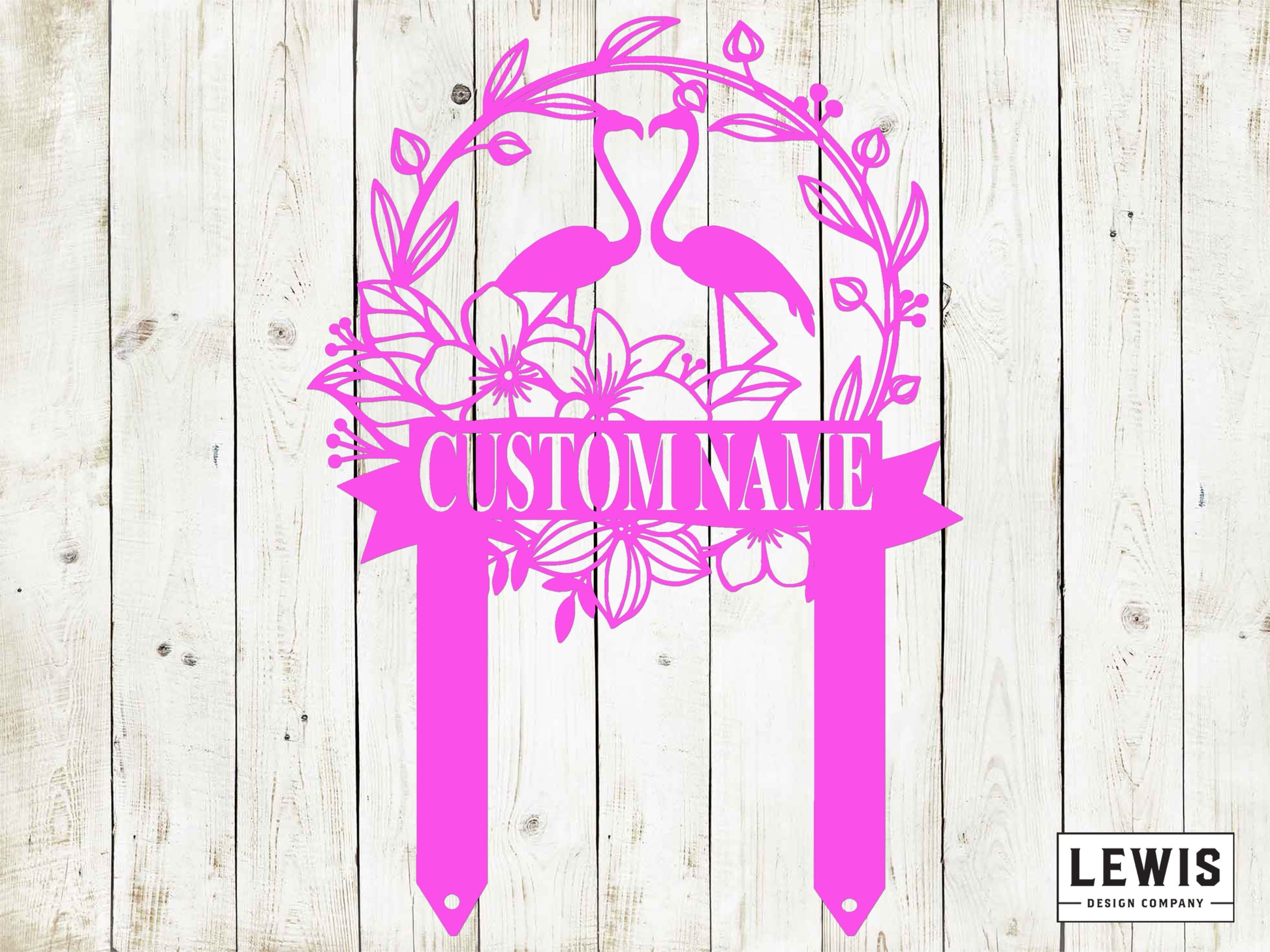 Pink decorative sign with flamingo design and 'Custom Name' text on a wooden background, featuring the Lewis Design Company logo.