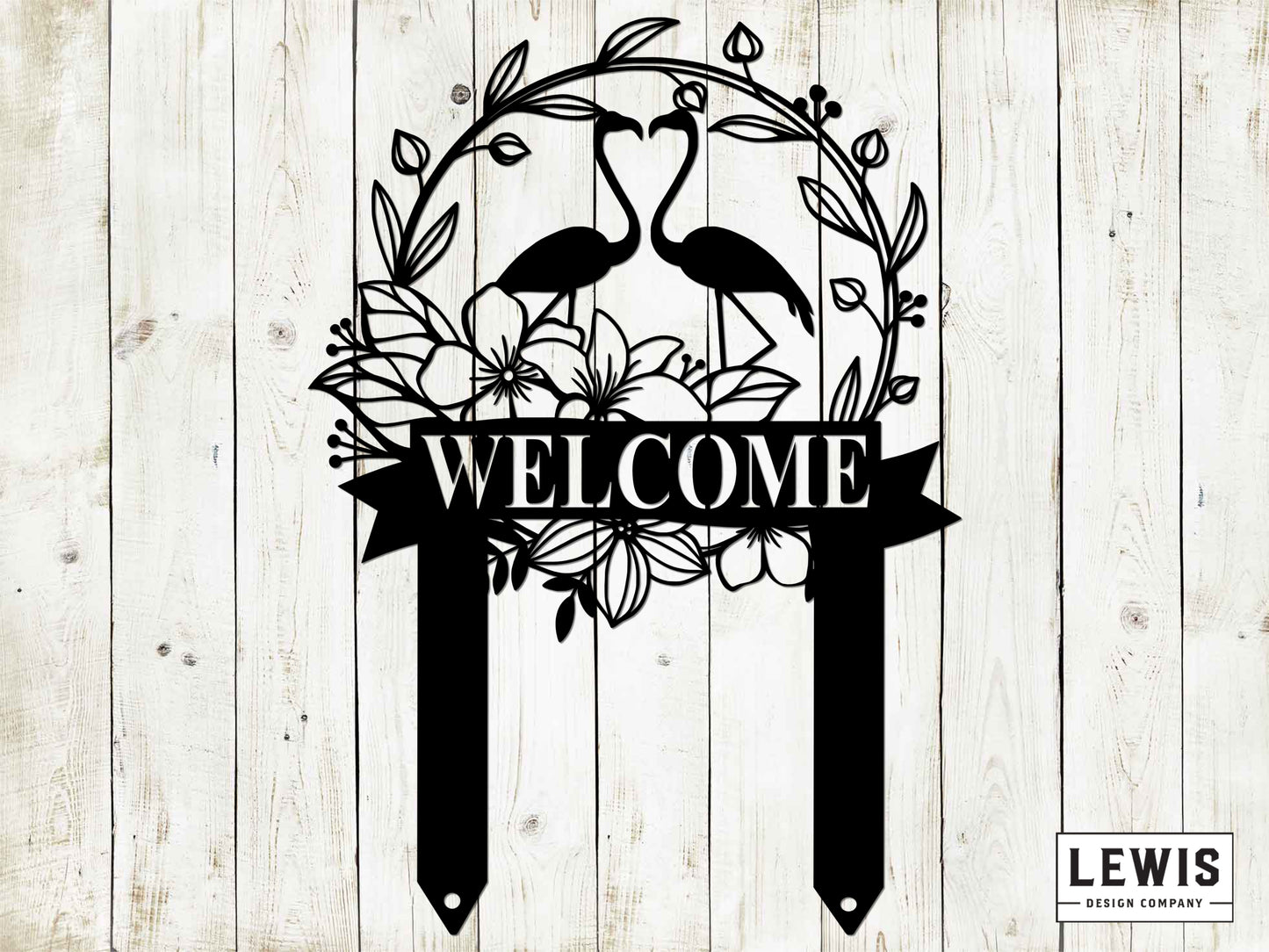 Decorative metal sign with 'WELCOME' and flamingo design on a wooden background, featuring the brand 'LEWIS Design Company'.