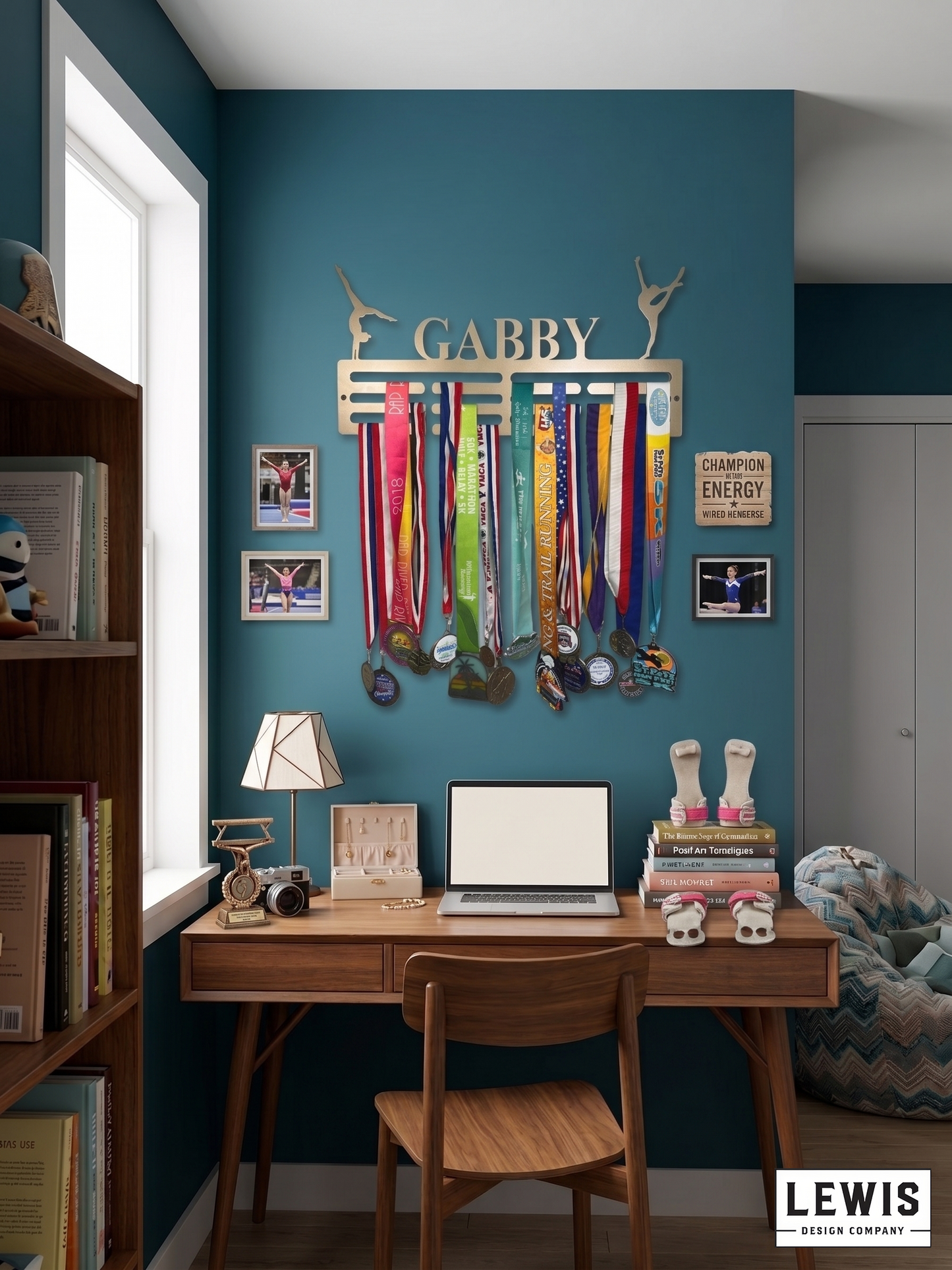 Home office with desk, chair, and wall-mounted medal display with 'GABBY' on a blue wall. Gymnastics Medal Hanger