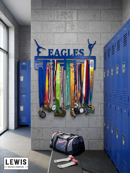 Medal display with 'EAGLES' on a wall in a locker room setting. Gymnastics Medal Hanger