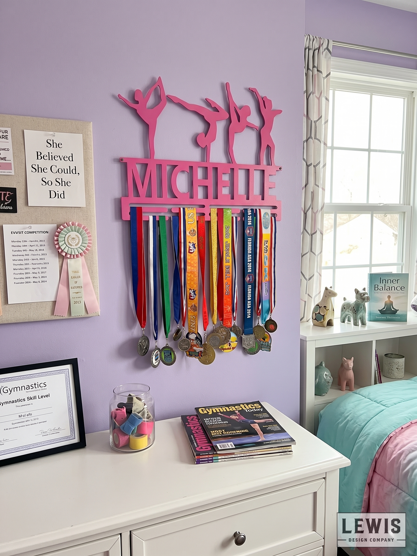 Pink medal holder with ribbons on a purple wall above a white dresser.