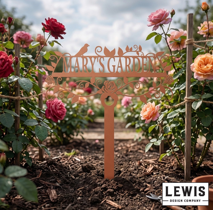 Decorative garden sign with 'MARY'S GARDEN' in a rose garden, featuring the Lewis Design Company logo.