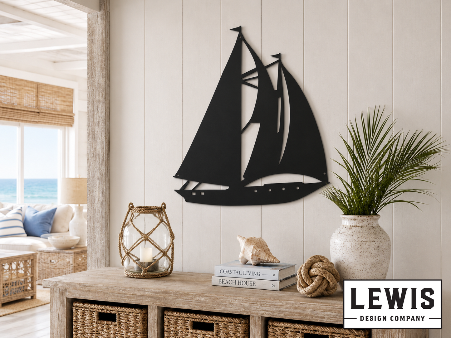 Black sailboat wall art on a wooden wall with decor items below.