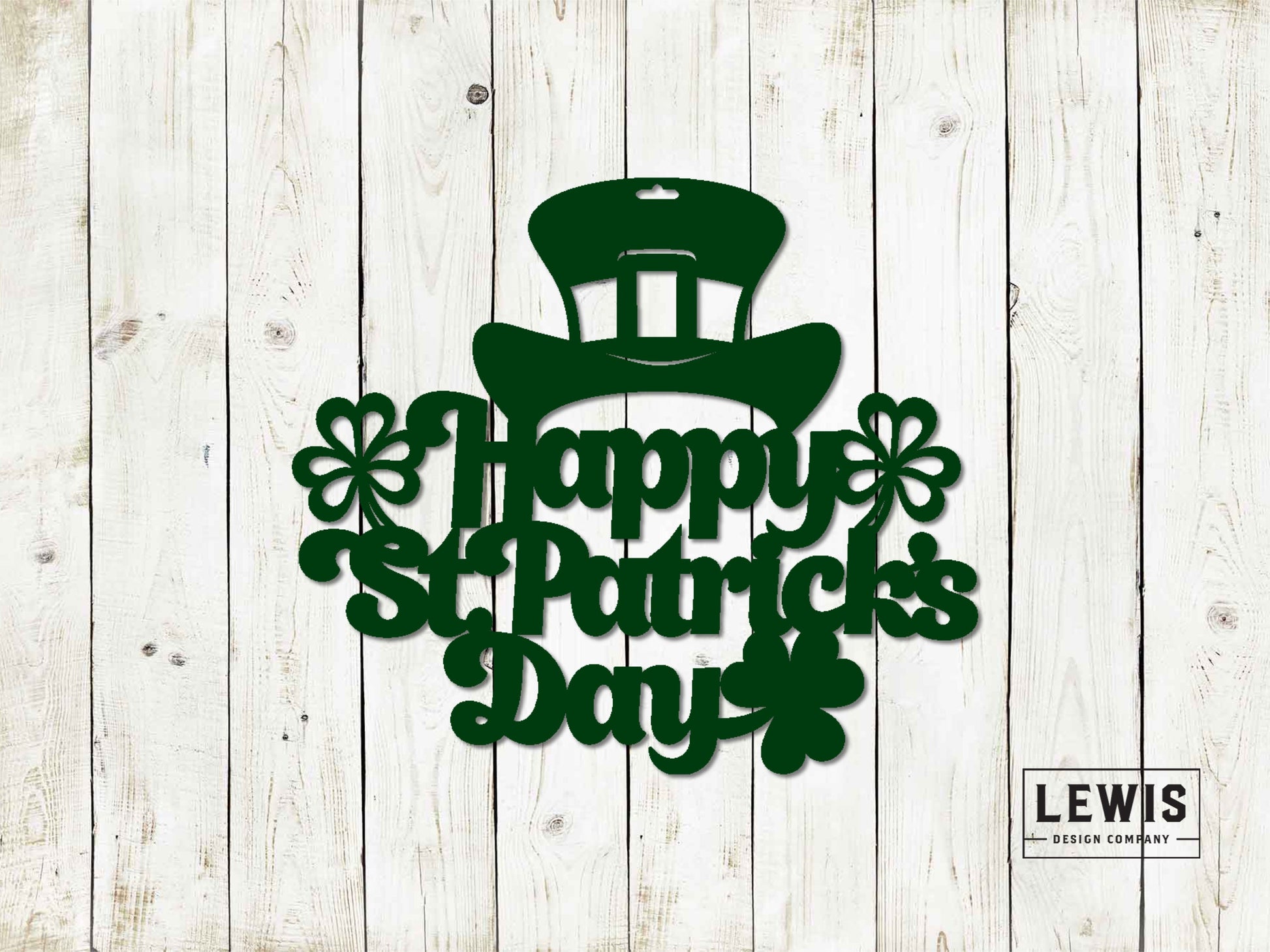 Green metal 'Happy St. Patrick's Day' sign with a large shamrock, against a white wooden background.