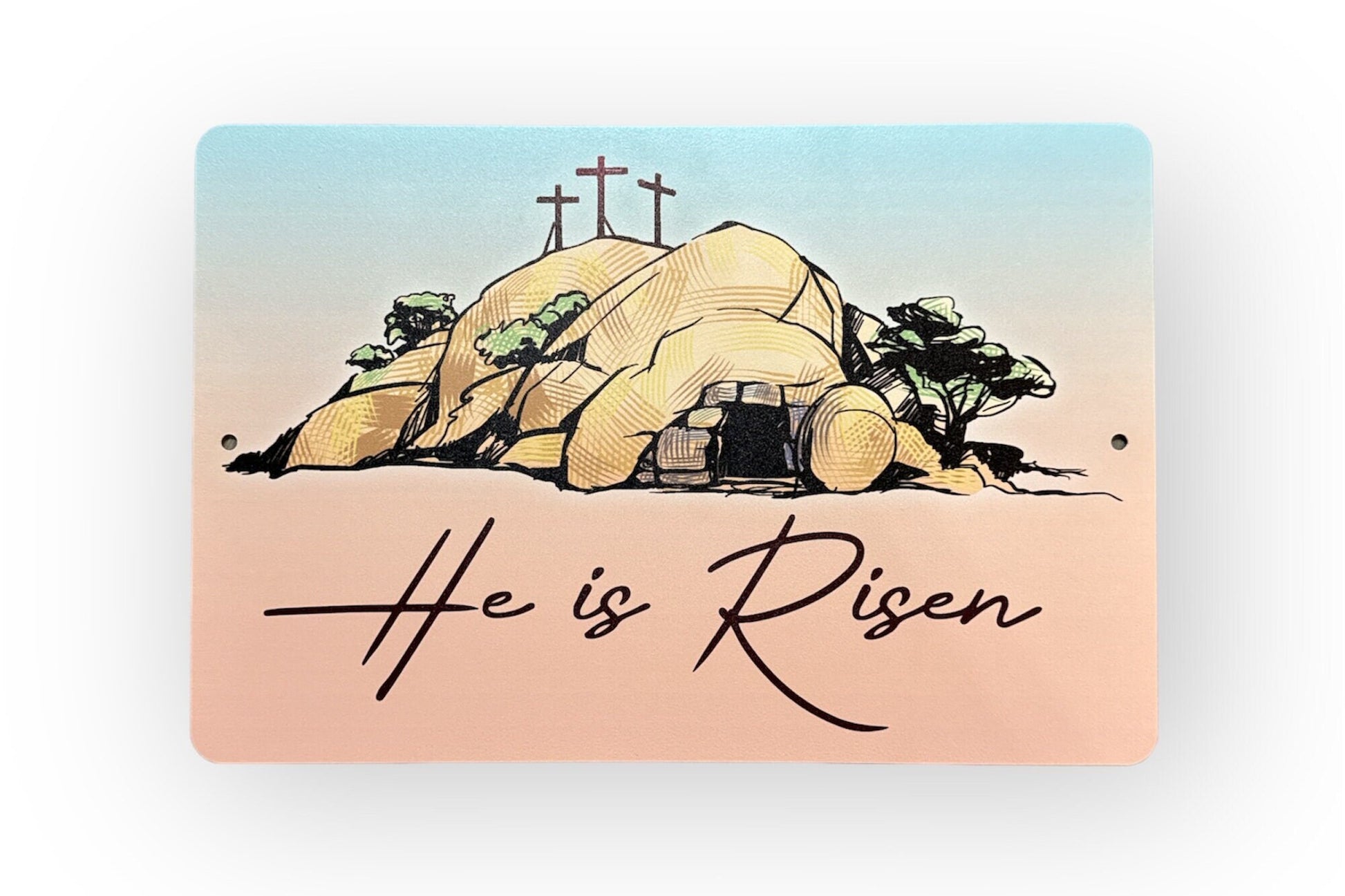 Close-up of 'He is Risen' Easter metal sign showing tomb and crosses with gradient background.