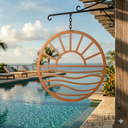 Copper Sun and Waves metal wall art hanging poolside at a beach house with ocean view and lounge chairs