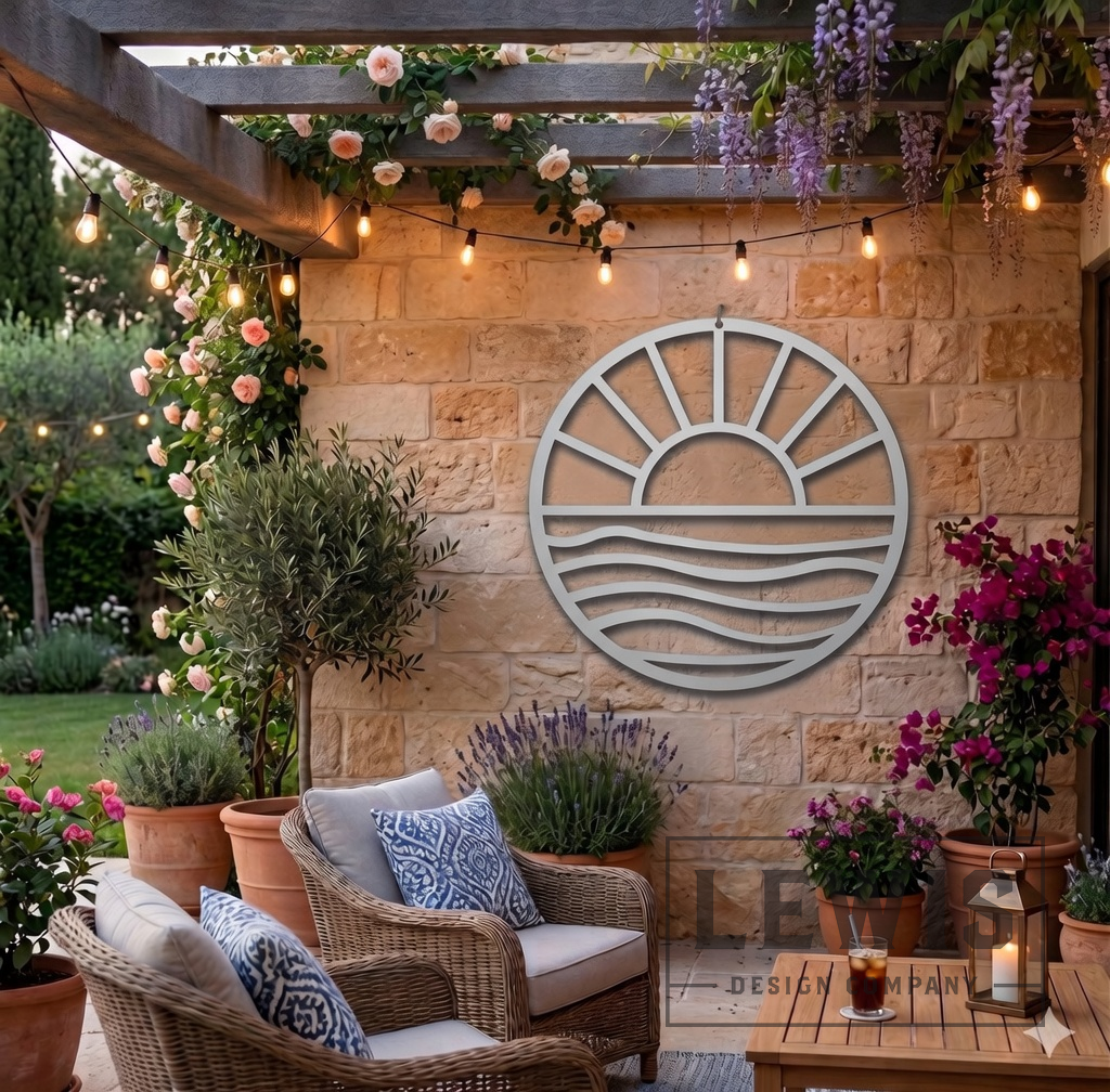 Silver Sun and Waves metal wall art hanging poolside at coastal beach house with palm trees and ocean view